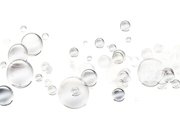 Air bubbles dance freely, their delicate forms captured against a pristine white backdrop, evoking a sense of lightness and purity.