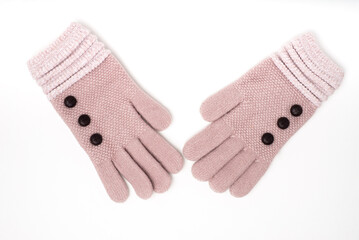 Women's knitted gloves isolated on white background.