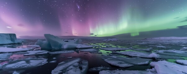 Beautiful view of Aurora borealis over snow covered sea or river in winter.