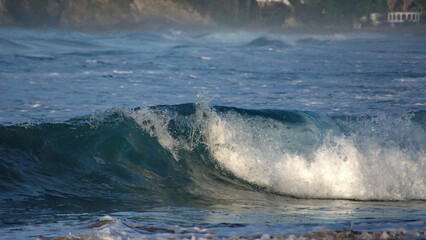 Waves breaking on the beach in Zipolite, Mexico