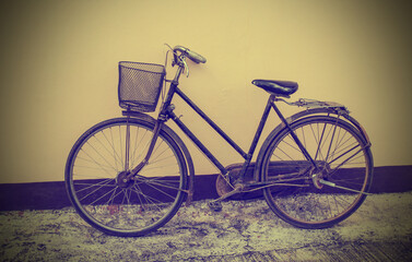 Vintage Bicycle Against Grunge Wall