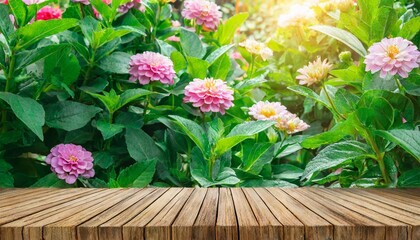 morning garden flower background with wood table top for product display or design layout