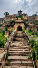 Fototapeta na wymiar Enthralling Architectural Grandeur - The Timeless Jhansi Fort Amidst Verdant Scenery Under Azure Sky