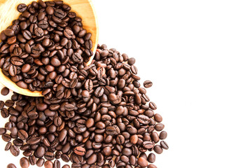 Roasted coffee beans pile from top on white background