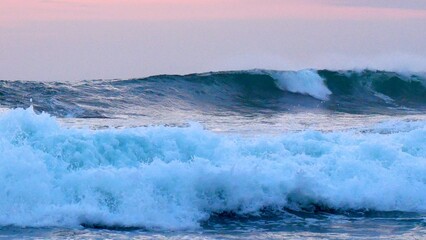 Tropical sea beach in summer time Purple sky on sunny day. Golden sand beach sea peaceful scenery on the beach. Travel vacation seaside outdoor. Ocean island beautiful dramatic Magenta landscape