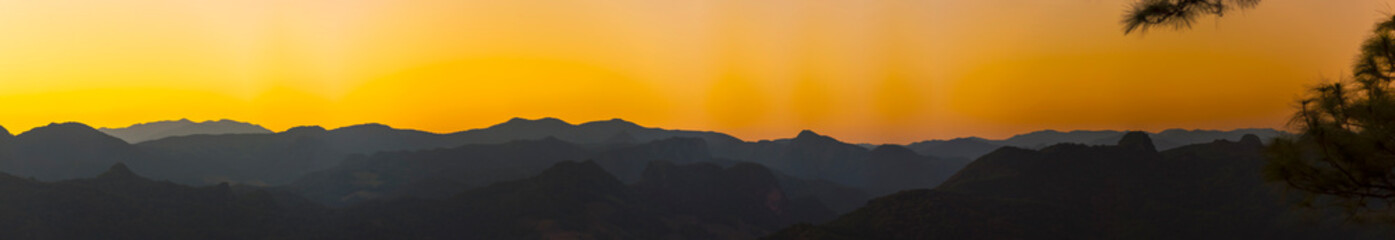 Banner Scenic view dramatic beautiful sunset sky. Panorama Natural Sunset Sunrise on meadow silhouette shadow dark land. Vibrant dramatic sky in Countryside. Landscape Sky At Sunset with copy space