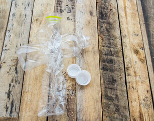 Plastic water bottles for recycle on the wooden table