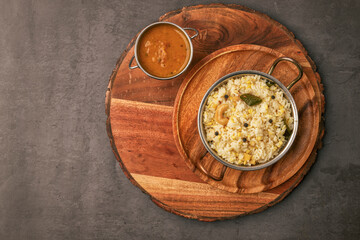 Fresh made Ven Pongal with Sambar served as a break fast in tamilnadu. Fresh pongal with sambar main break fast and dinner south indian dish