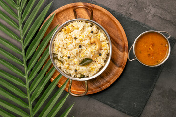 Fresh made Ven Pongal with Sambar served as a break fast in tamilnadu. Fresh pongal with sambar main break fast and dinner south indian dish