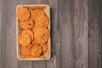Thattai or Nippattu or Chekkalu is a south Indian deep fried snack made with rice flour prepared during festive and daily common snack.  Thattai is a south Indian fried snack, Spicy and Crispy