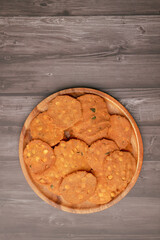 Thattai or Nippattu or Chekkalu is a south Indian deep fried snack made with rice flour prepared during festive and daily common snack.  Thattai is a south Indian fried snack, Spicy and Crispy