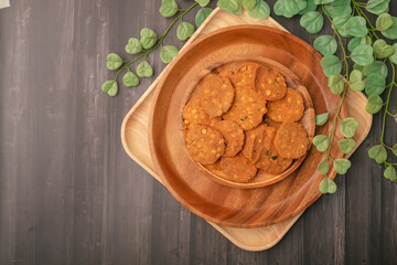 Thattai or Nippattu or Chekkalu is a south Indian deep fried snack made with rice flour prepared during festive and daily common snack.  Thattai is a south Indian fried snack, Spicy and Crispy