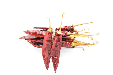 Dried chili peppers on white background