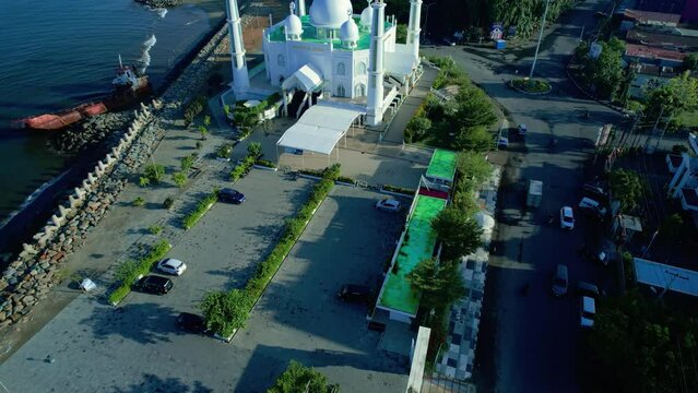 Aerial view at morning of the Al-Hakim Mosque near the coast of Padang City, West Sumatra.