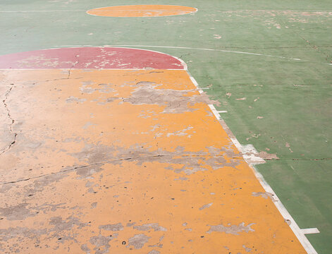 old concrete basketball court