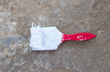 paint brush on the cement floor