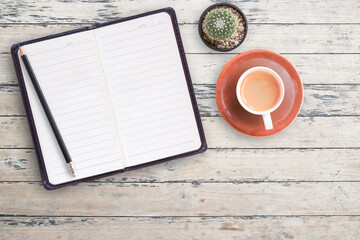 Blank notebooks on wood background