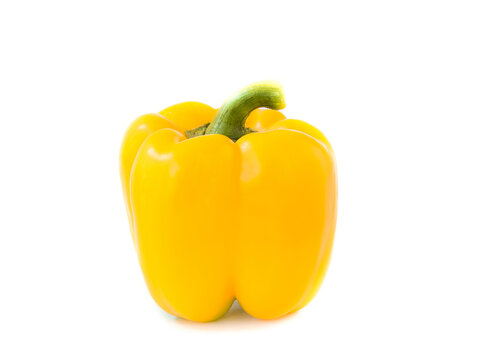 Close up of fresh yellow pepper on white background