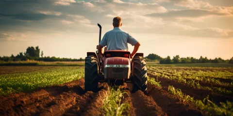 Deurstickers man in wheelchair, Silhouette man driving tractor on field against sky during sunset, Generative AI © muzamil