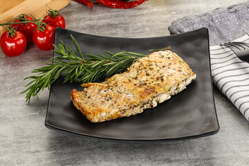 Baked salmon fish served rosemary