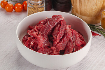 Raw beef meat - sliced strips