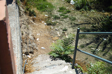 staircase and littered ground