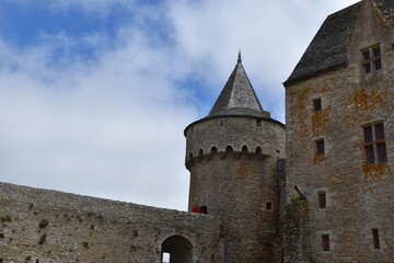 Fototapeta na wymiar Suscinio Castle Detail: Tower, Wall, and blue sky in Brittany, France