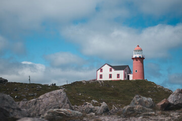 Fototapeta na wymiar Ferryland lighthouse on a cloudy day
