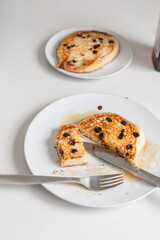 eating homemade pancakes in the kitchen