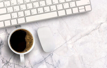 Morning black coffee and mini mouse and keyboard wireless on white marble background.