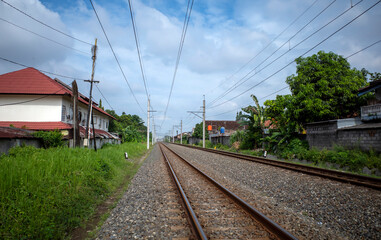 Rel Kereta, railway tracks around settlements in rural areas in Indonesia