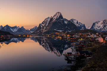 Reine city view point with a beautiful reflection on the sunset view.  - obrazy, fototapety, plakaty