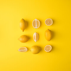 Creative Pattern concept Flat lay minimal layout made from sliced lemon on yellow background.