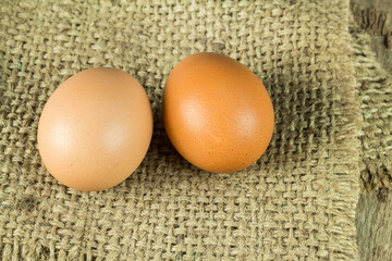 Close up egg on wooden table