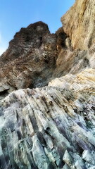 Majestic Rock Formations Towering Skyward. Geology Unveiled in Striated Cliffs and Layers