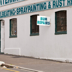 Obraz premium Comic, building and sign with funny information, notification and message on private property. Signage, symbol and mistake or error on poster, board or attention for warning, direction or advertising