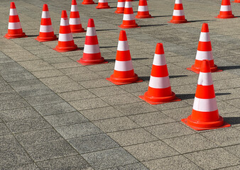 Traffic cones on the paving stone area