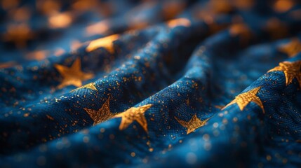 This image shows a close-up view of a rich, blue fabric with a gold star pattern