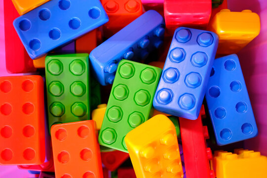 Plastic toy bricks in a variety of shapes and colors, for endless building fun
