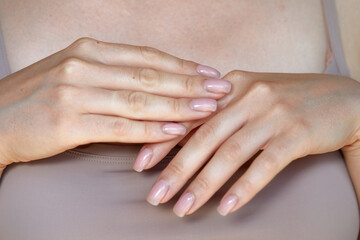 Beautiful Woman hand closeup. Manicure and Hands Spa. Manicured nails and Soft hands skin. Cosmetology, beauty. Skin care