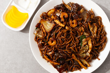 Platter Jjajangmyeon with stir-fried noodles in Jjajang sauce