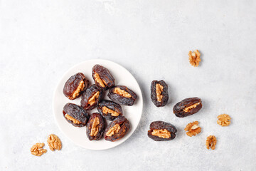 Fresh organic and various sweet dried date fruits.