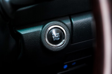 Close up engine car start button. Start stop engine modern new car button,Makes it easy to turn your auto mobile on and off. a key fob unique ,selective focus	
