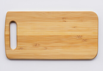 Wood cutting board on white