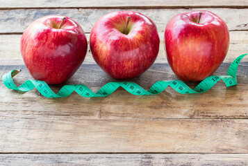 Fresh apples on a wooden table