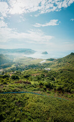 Exploring the Serene Beauty of Indonesia: Lombok's Hills and Ocean from a Mesmerizing Drone View"