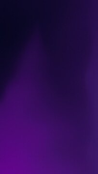 Vertical loop video of gradient and grainy abstract flowing background in purple color