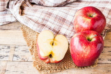 fresh red apple on wooden table