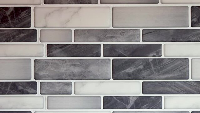 Textura, wallpaper, fondo en formas geometricas rectangulares en colores grises, panel decorativo artificial para cocinas, video 4k