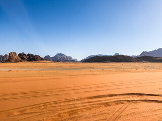 Fototapeta na wymiar The amazing rock formations, Red Sand and natural beauty of Wadi Rum Desert in Jordan